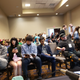 The room was filled to capacity within the first few minutes, with even more people standing at the back.